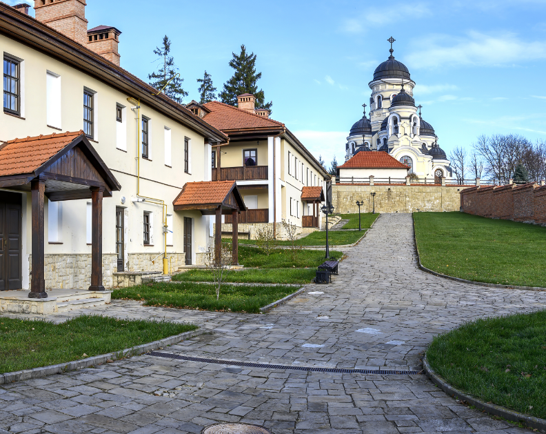 panorama capriana monastery visible winter stone churches bare trees green lawns buildings good weather moldova