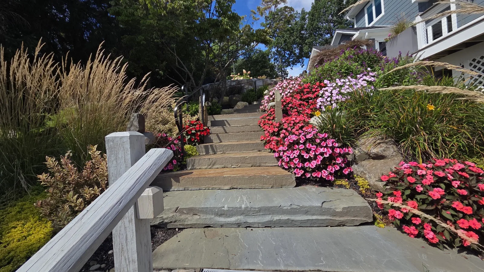 Stone steps surrounded by flowers in Ossining